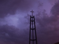 Sunset behind Church steeple photo thumbnail