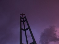 Sunset behind Church steeple photo thumbnail