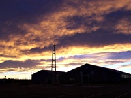 Sunset behind Church steeple photo thumbnail