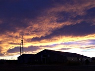 Sunset behind Church steeple photo thumbnail