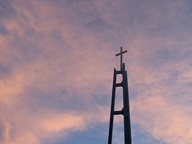 Sunset behind Church steeple photo thumbnail