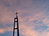 Sunset behind Church steeple photo thumbnail