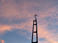 Sunset behind Church steeple photo thumbnail