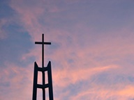 Sunset behind Church steeple photo thumbnail
